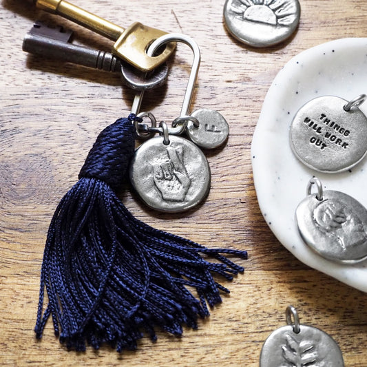 Motto Coin + Tassel Keyring